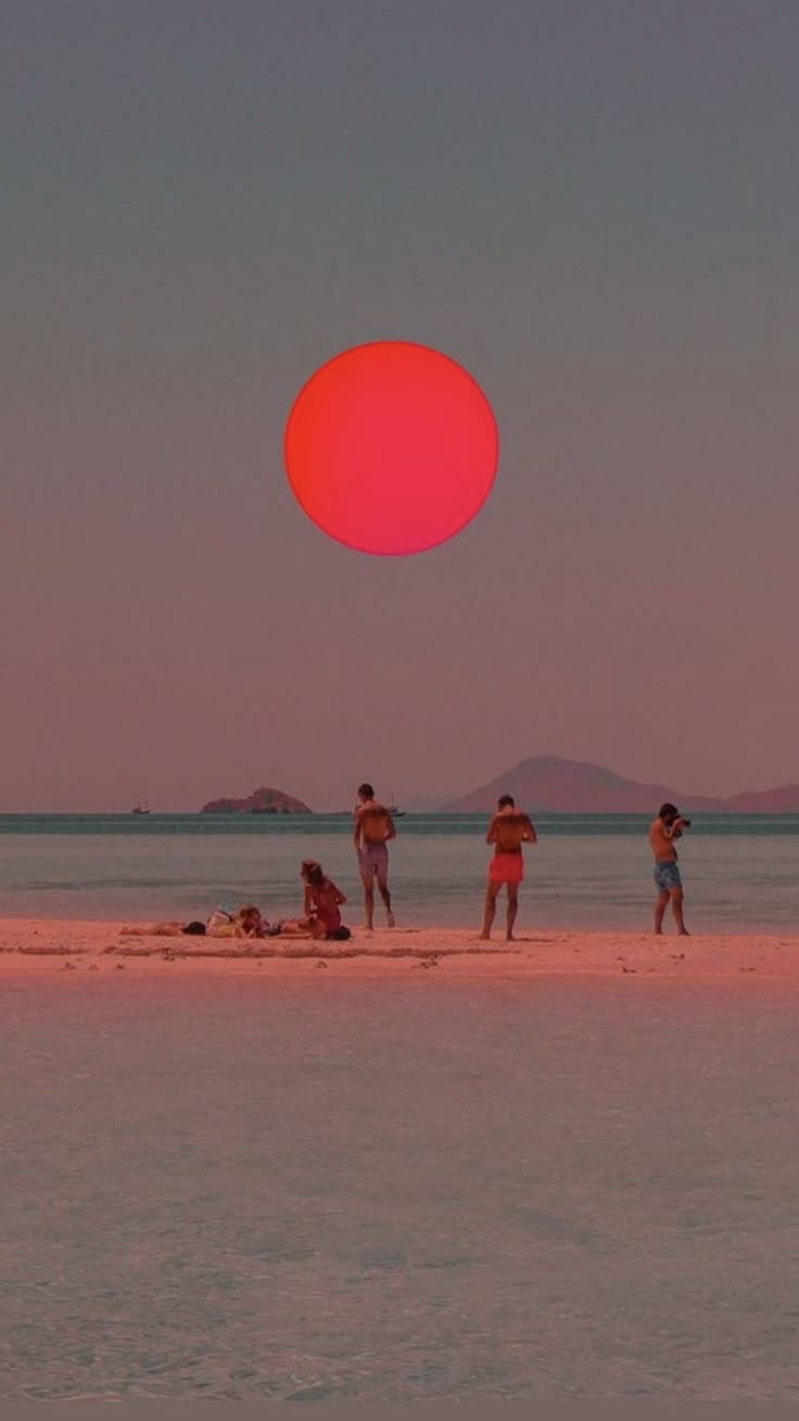 Beach with red sun